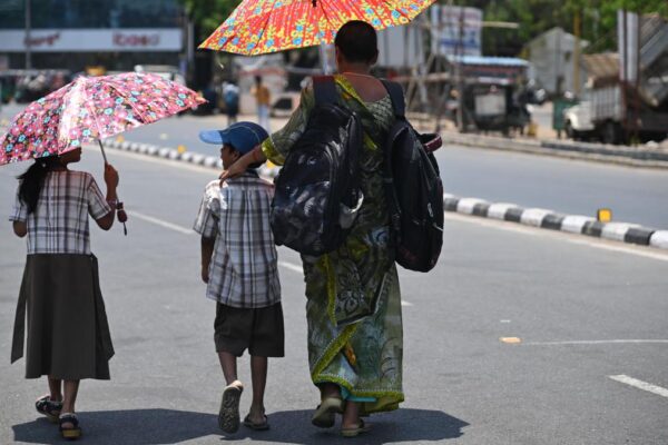 Children stay away from play as city reels under heat